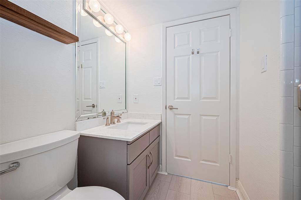 Full bathroom downstairs with shower can be used for guests and also has private access to the secondary bedroom downstairs.