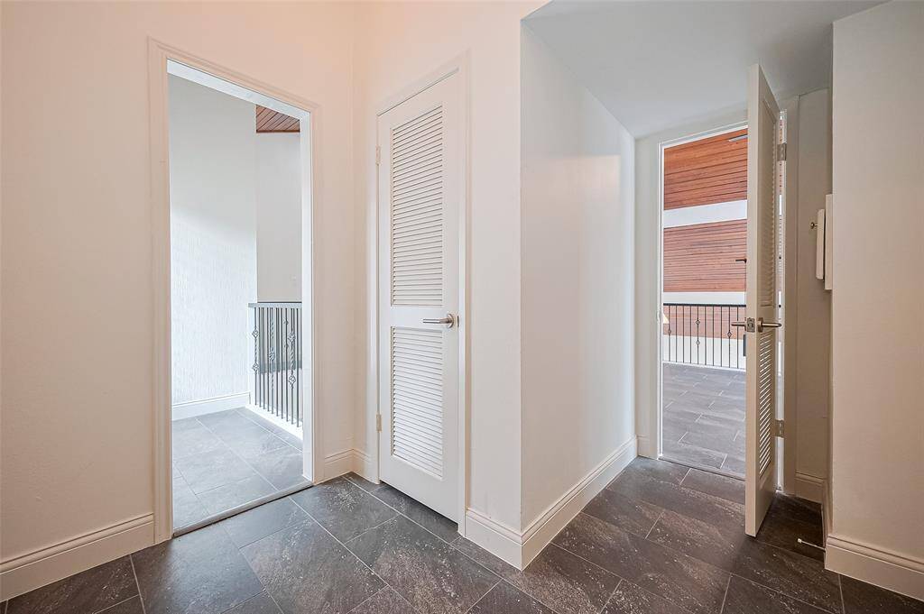 Bonus room tucked behind the upstairs loft with catwalk to the left.  Would be a cute space for a reading chair.