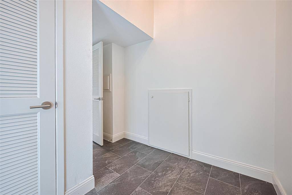 The bonus room has plenty of space for desk or shelves for storage.