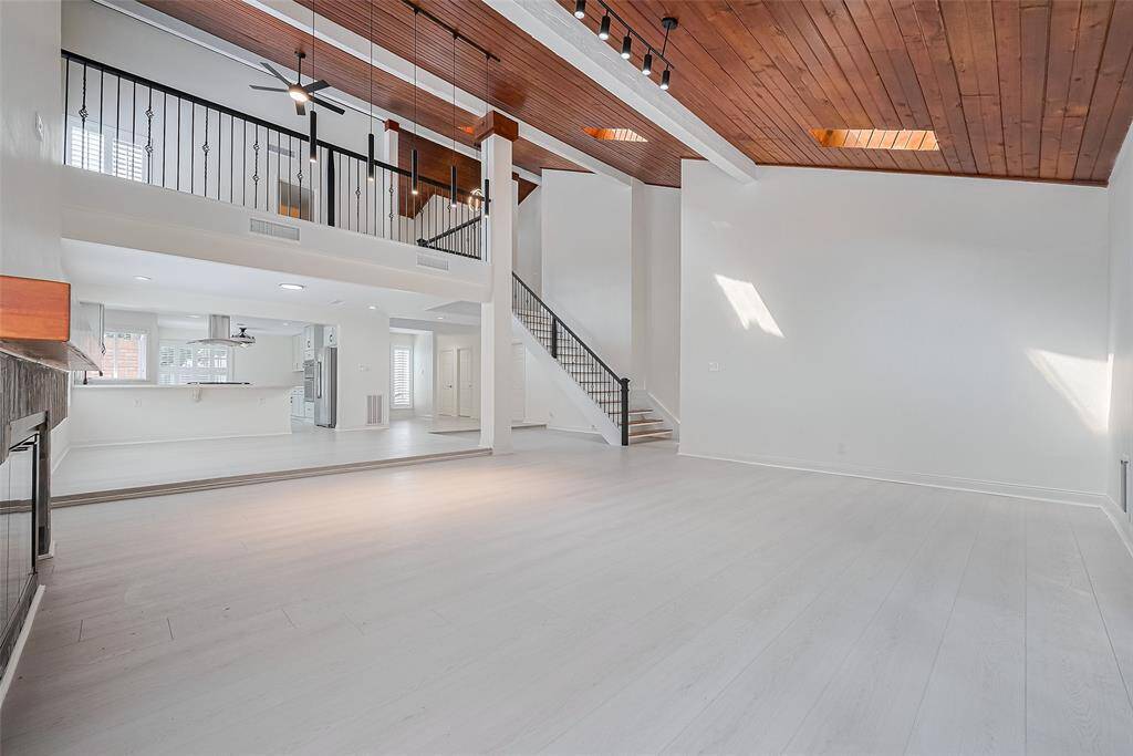 The living area has plenty of space for the biggest sectional and tons of natural lighting.