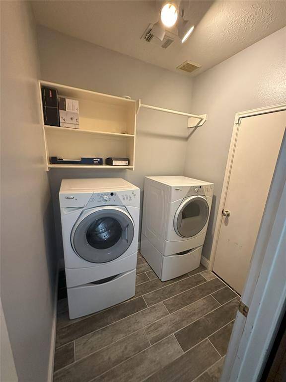 Utility room - Washer/Dryer remains.  Door leads to garage