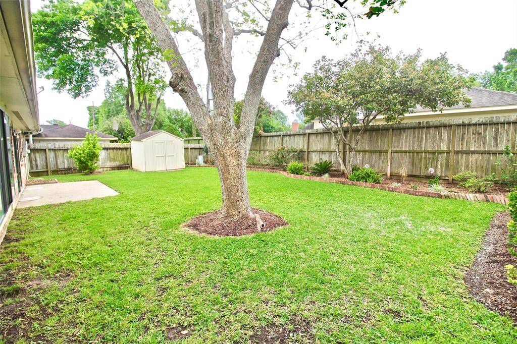 Different angle view of the spacious yard and patio, ready for your enjoyment!