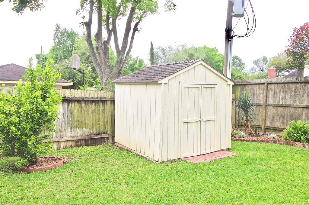 Enjoy a convenient outdoor storage shed.