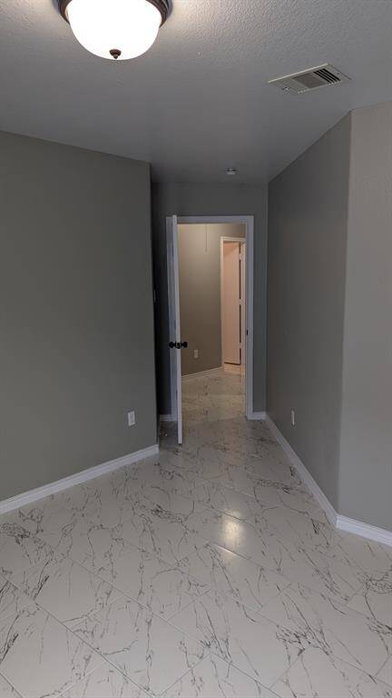Hallway to family and kitchen