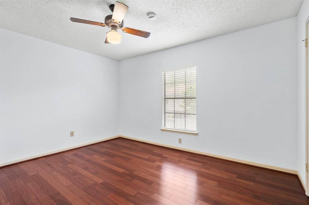 All bedrooms feature lighted ceiling fans and walk-in closets.