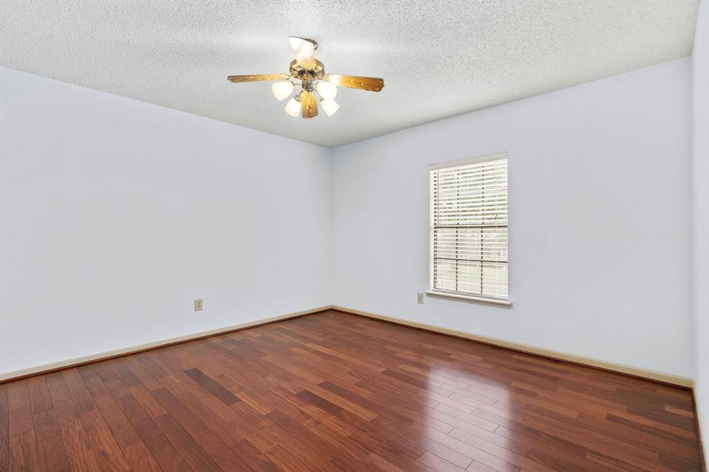 Another secondary bedroom. Included in the lease is a full-sized washing machine, dryer, and refrigerator.