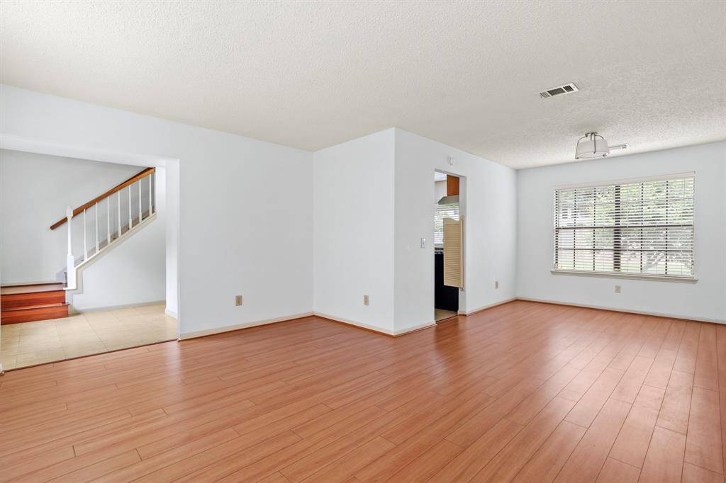 Updated laminate flooring is durable and easy to maintain.