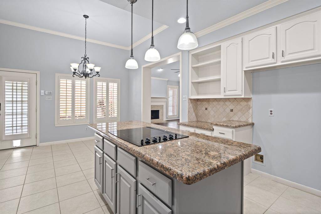The center island also provides additional storage space for cookware.