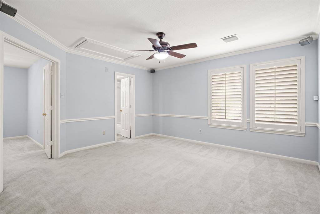 The upstairs game room provides a versatile space to unwind or entertain, offering plenty of room for recreation, relaxation, and fun gatherings.