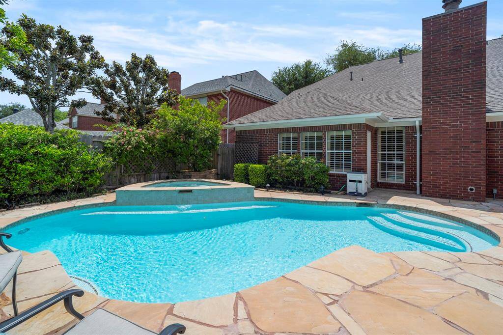 Major updates include 2025 Roof, 2023 Trane AC, and 2023 pool re-plaster.