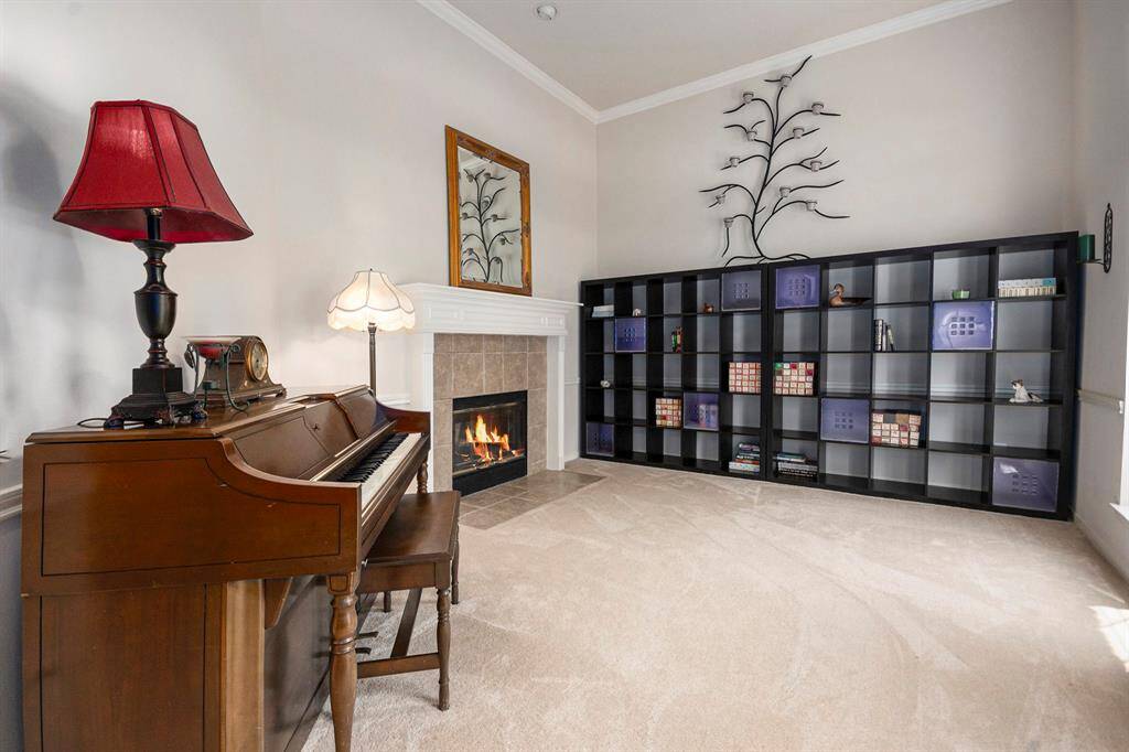 Formal living room with two-sided fireplace
