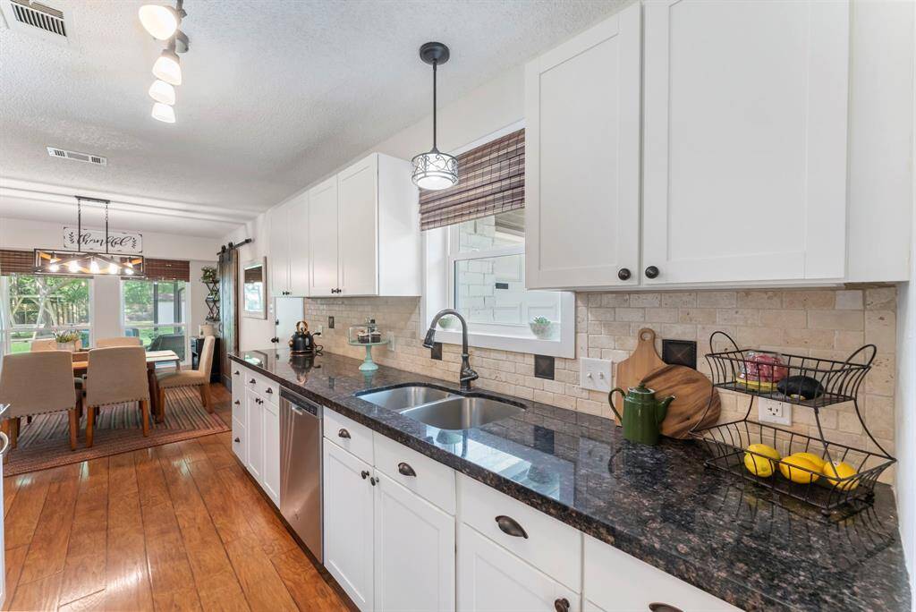 The dining room is located near the kitchen.