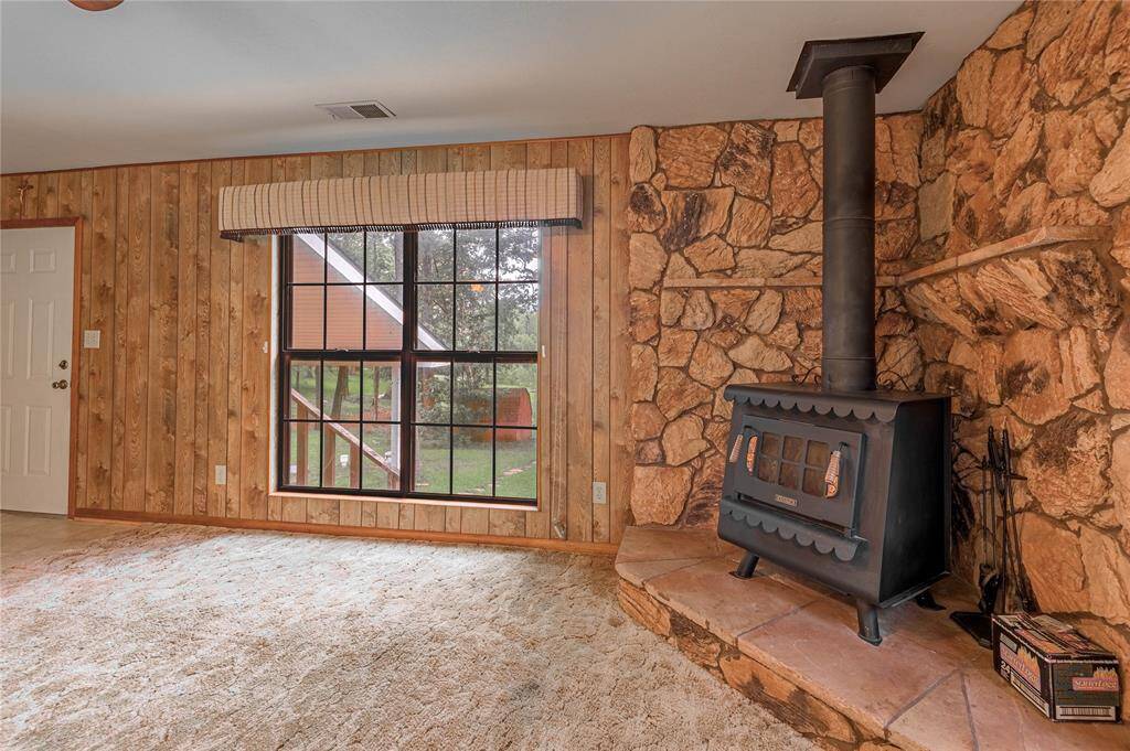 Wood stove and large window