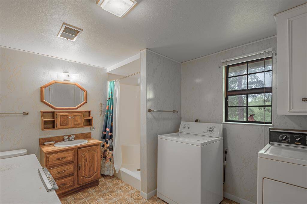 Bathroom and laundry room downstairs
