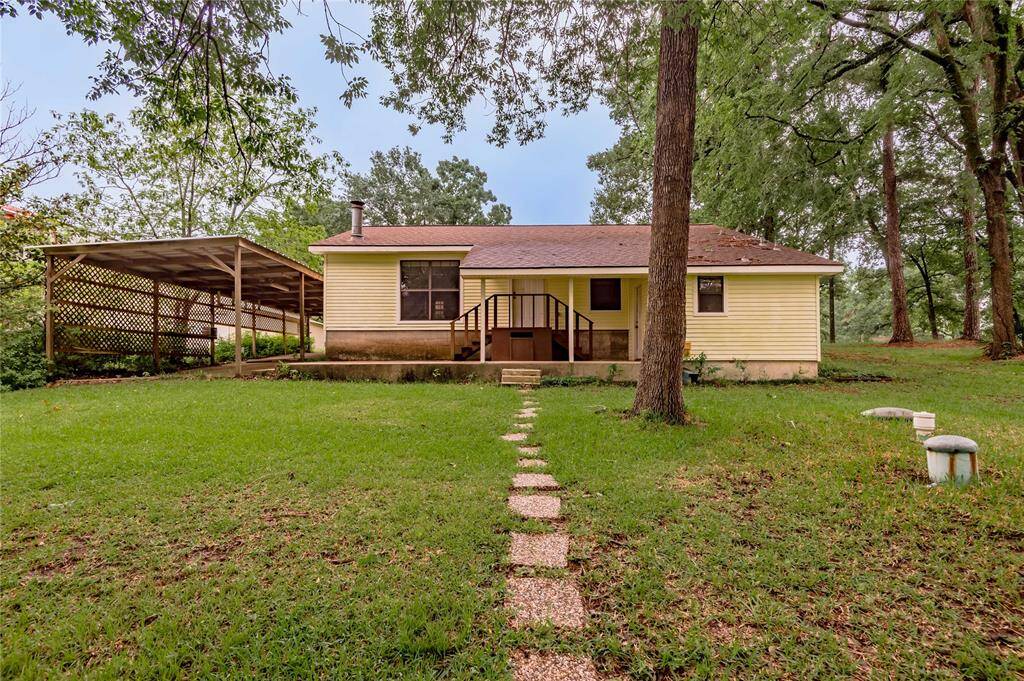 Back of home and carport