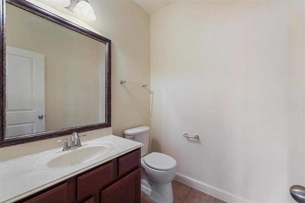 Upstairs half bath.
