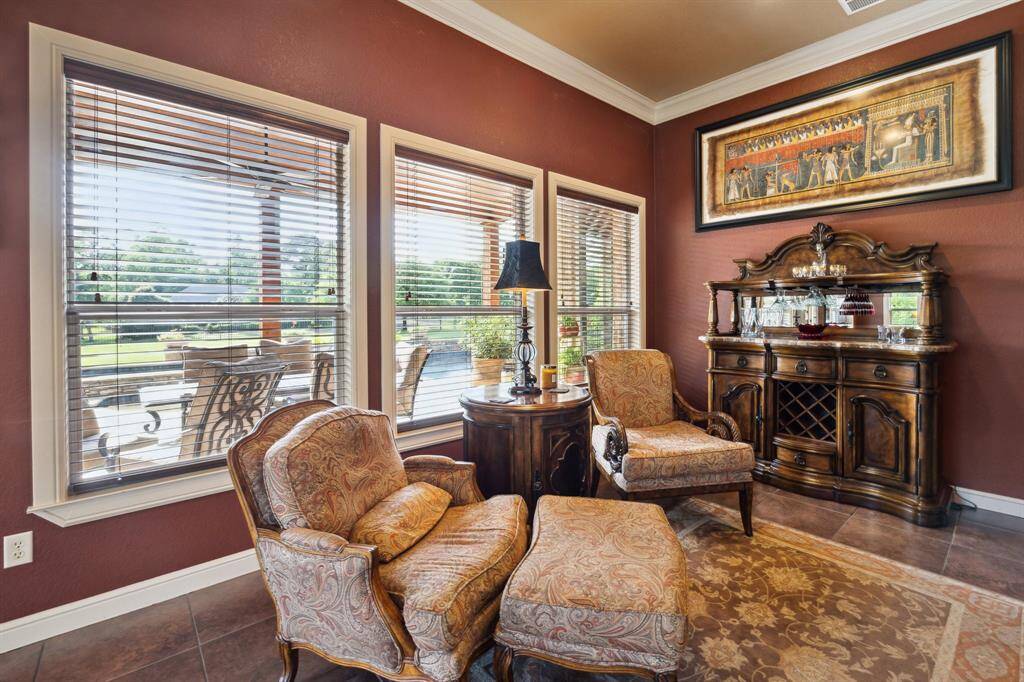 This is an ideal spot to relax and unwind while taking in the peaceful backyard and lake views.