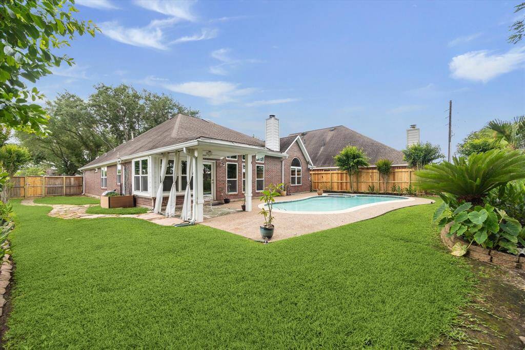 Welcome to 3947 Heritage Colony Drive in Missouri City, TX. This stunning home sits on a premium oversized lot and provides amble relaxation and privacy as you have no back or side neighbors. The backyard offers plenty of grass space, along with a side yard that features a new gate door and a lovely herb garden.
