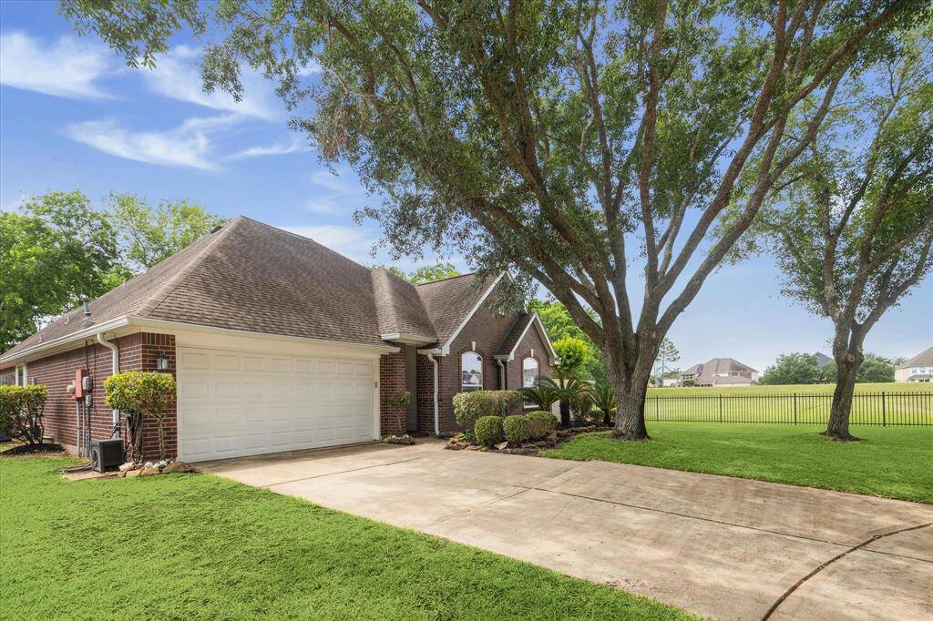 A side view of this property which shows how expansive and private the lot is.