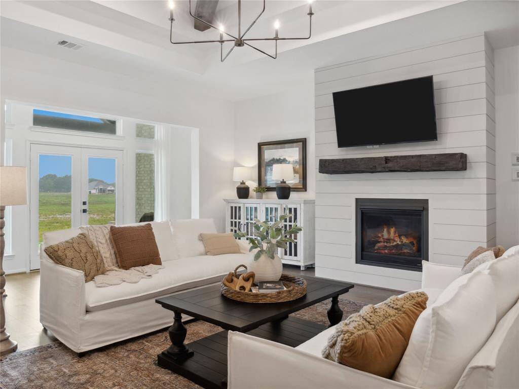 Impressive great room with cozy fireplace (*Photo not of actual home and used for illustration purposes only.)