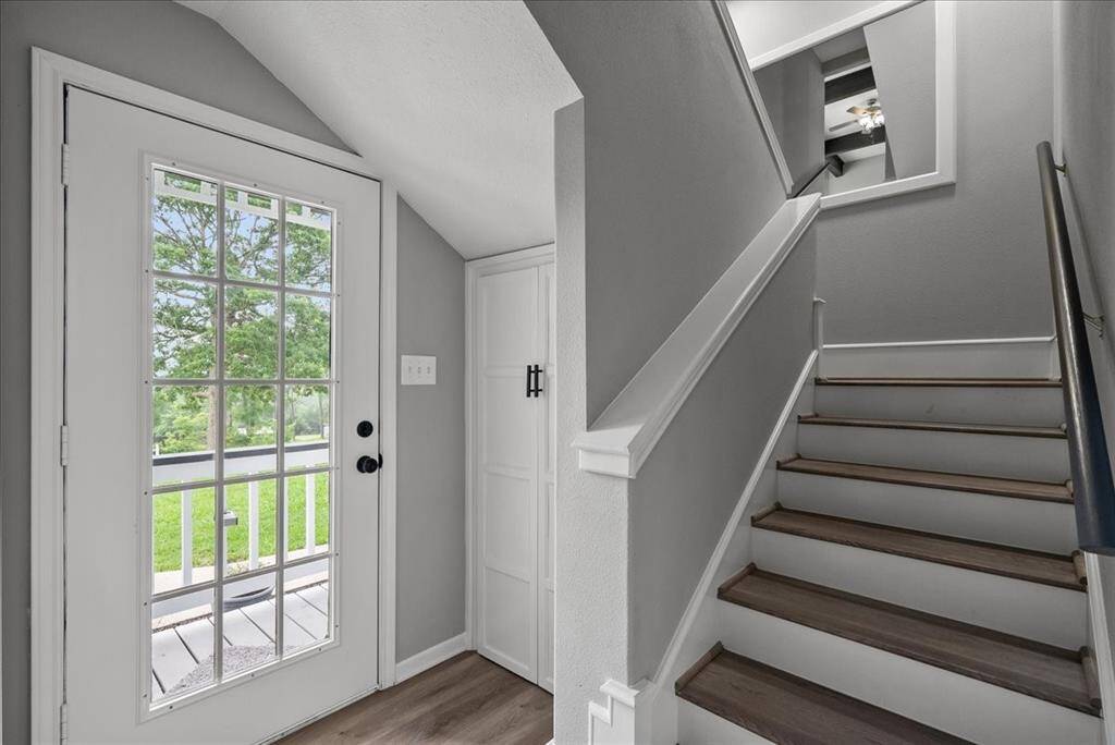 Stairs leading from first floor up to 2nd floor