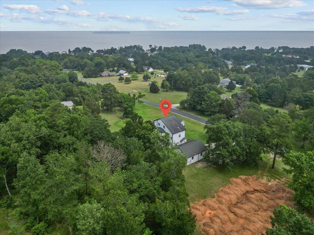 View of home in proximity to the lake