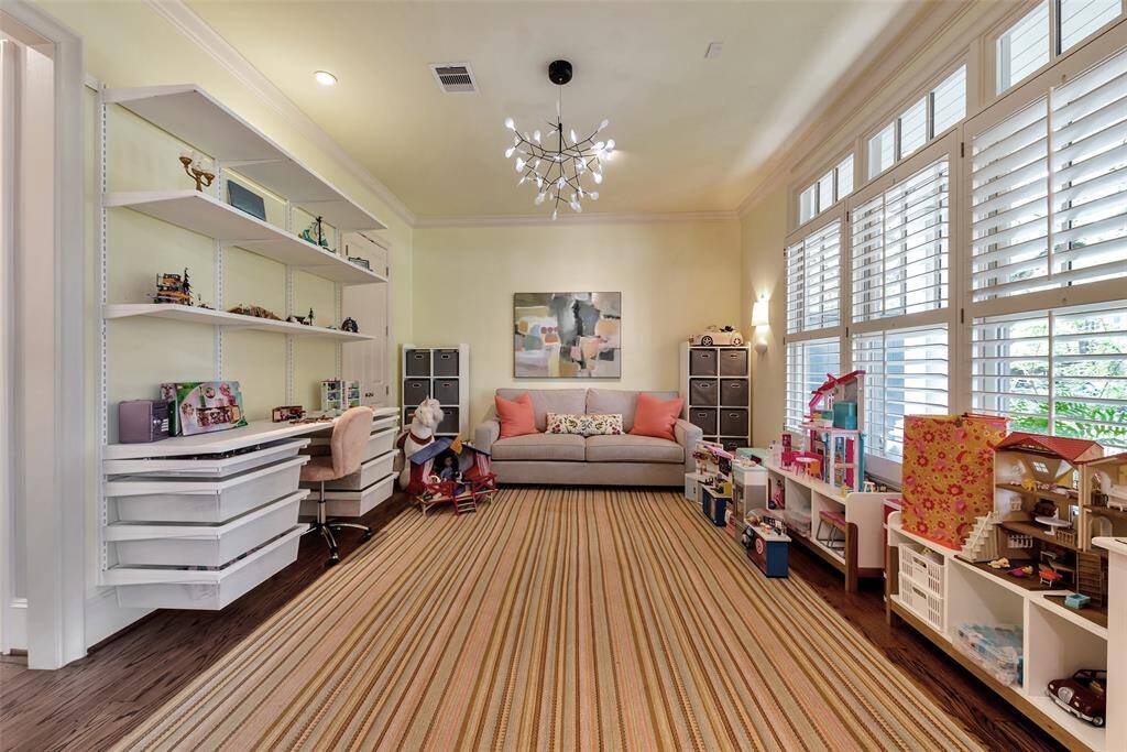 The Spacious light filled dining room is currently being used as a downstairs playroom.