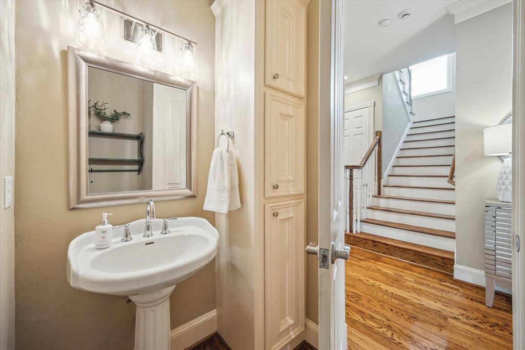 Powder Bath is located near the stairway and main entry.