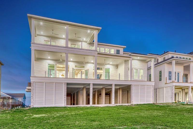 Enjoy stunning sunrise and sunset views through expansive windows with beautiful natural lighting. Features a convenient secondary back entrance.