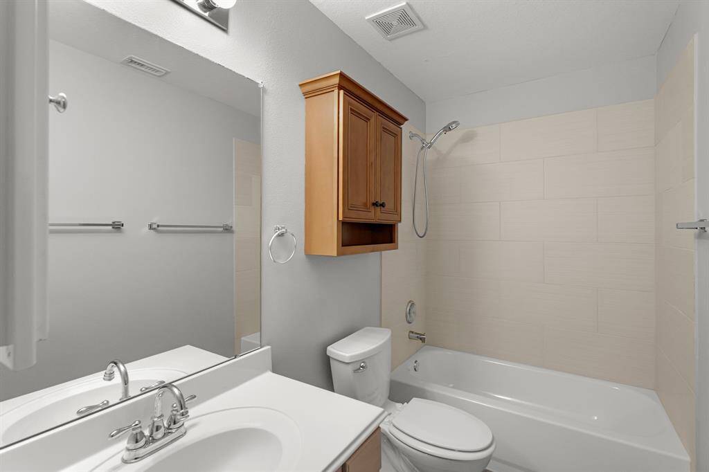 Full Bathroom with new tile bathtub