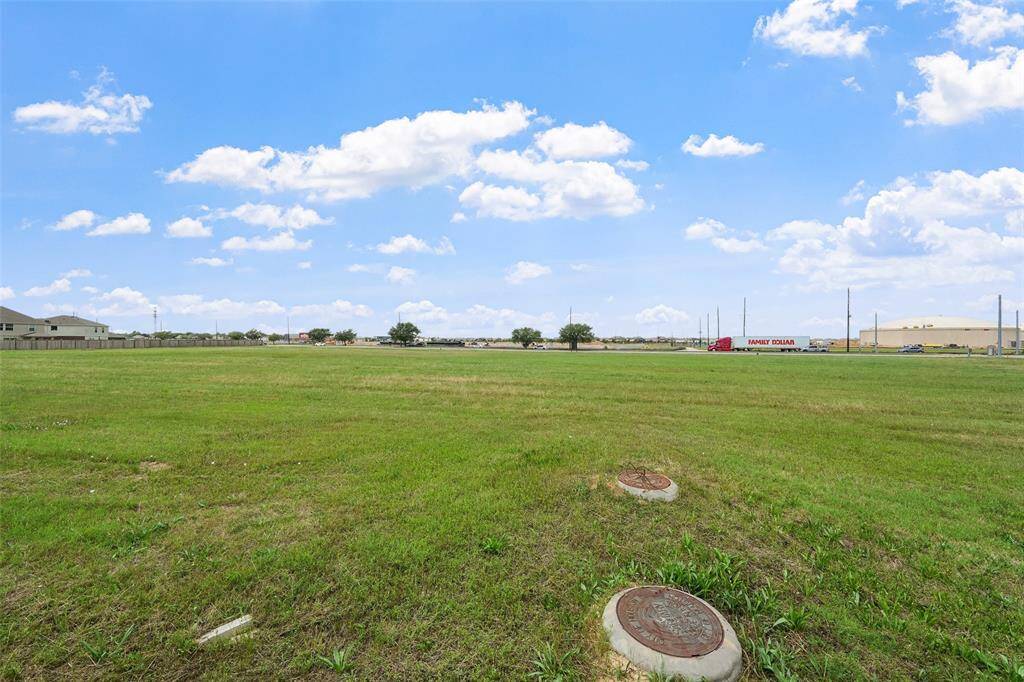 Green space directly behind the house