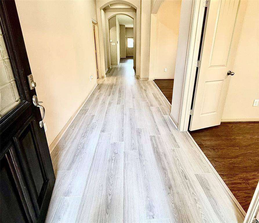 Entry with wood like laminate floors
