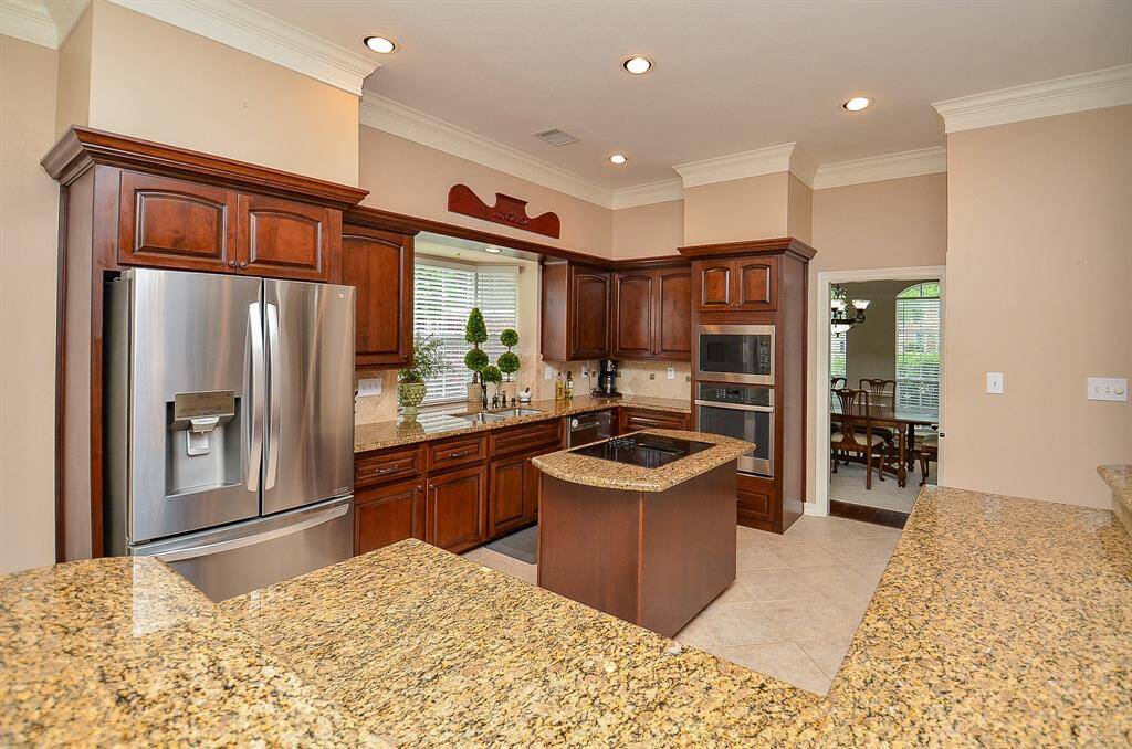Wide floor paths allow comfortable tasking no matter where you land, with formal dining just footsteps away.