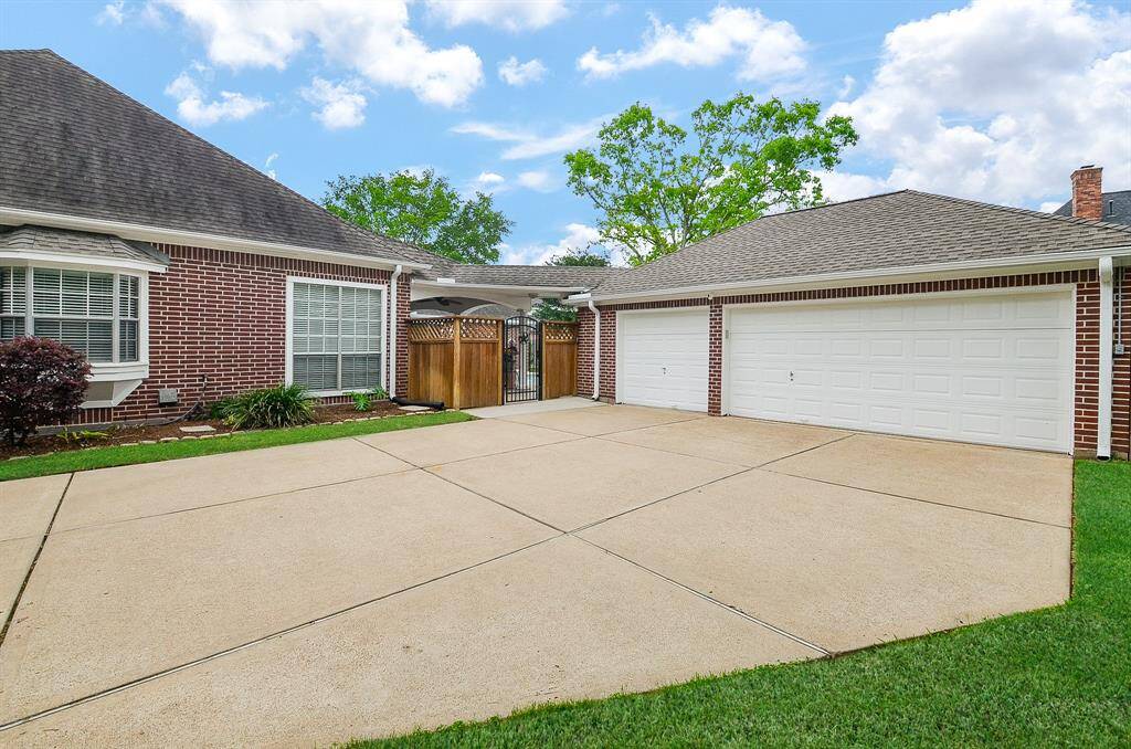 The covered walkway offers easy access to the home, while providing comfortable privacy.