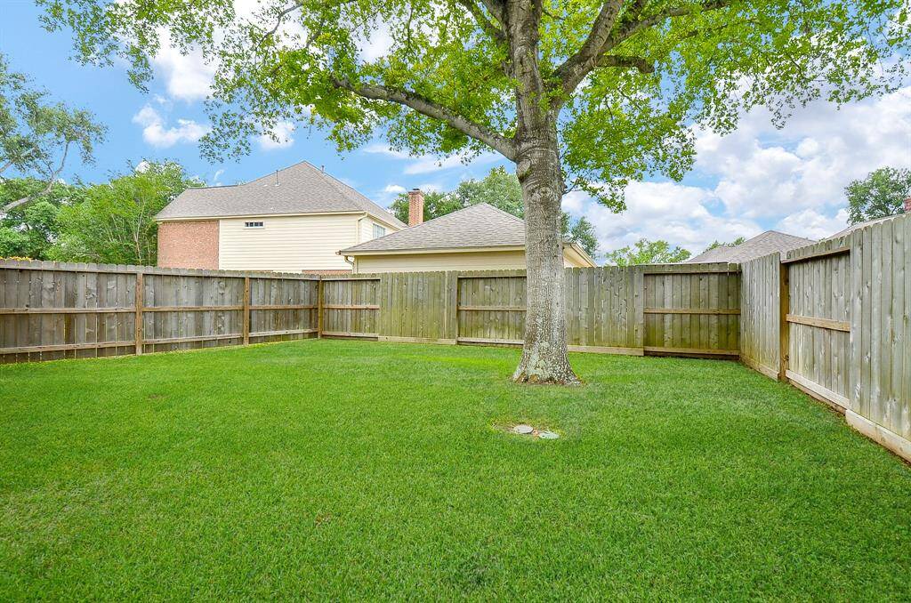 Privacy fencing surrounds the entire back property.