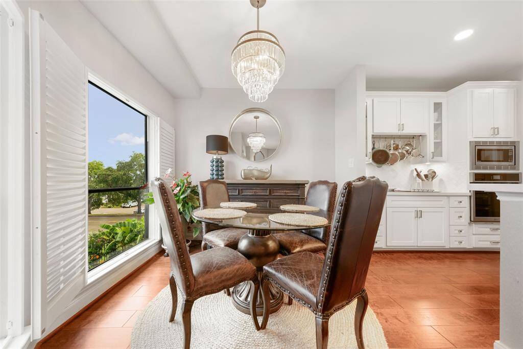 This breakfast area is so convenient to the kitchen at right.