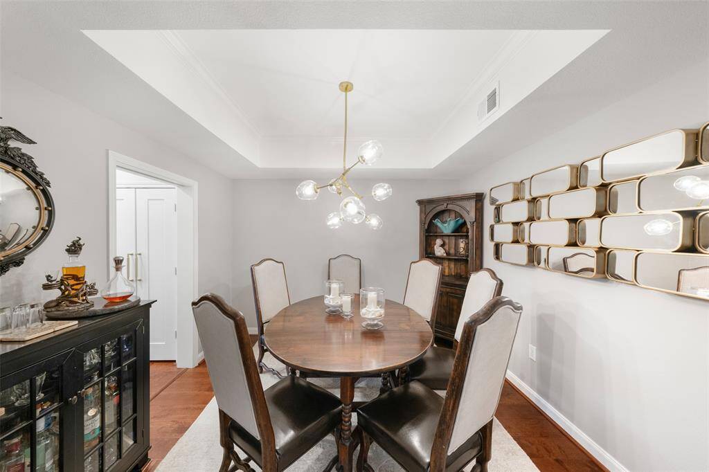 The formal dining room is perfect for entertaining, whether serving a holiday meal or for game night.