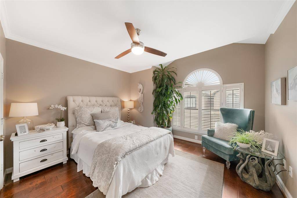 With its gleaming hardwoods and large window, this second of two bedrooms is both beautiful and spacious.  There's virtually room for any-size furniture you like!