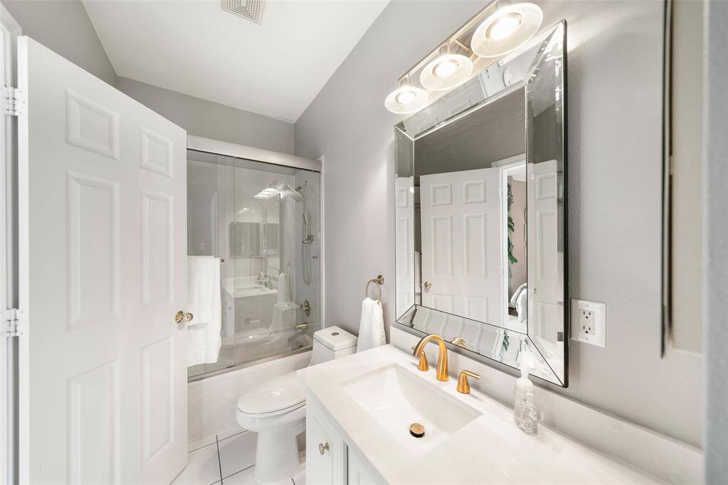 The beautifully-updated second bathroom adjoins the bedroom. Every detail in this townhome has been well thought out and carefully executed.