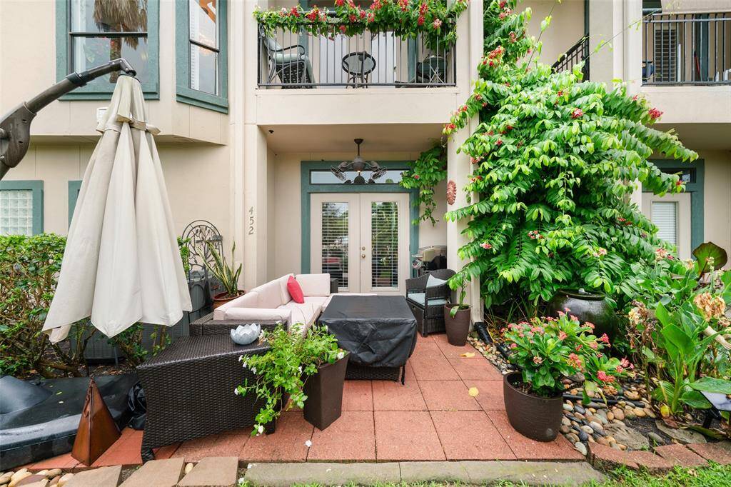 From this angle, you can see the balcony directly above the covered patio.