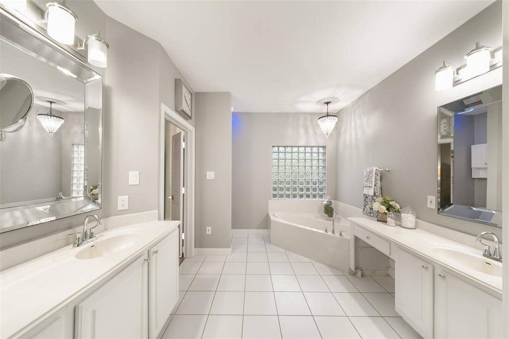 With its soothing color scheme, this bathroom truly is a spa-like retreat.