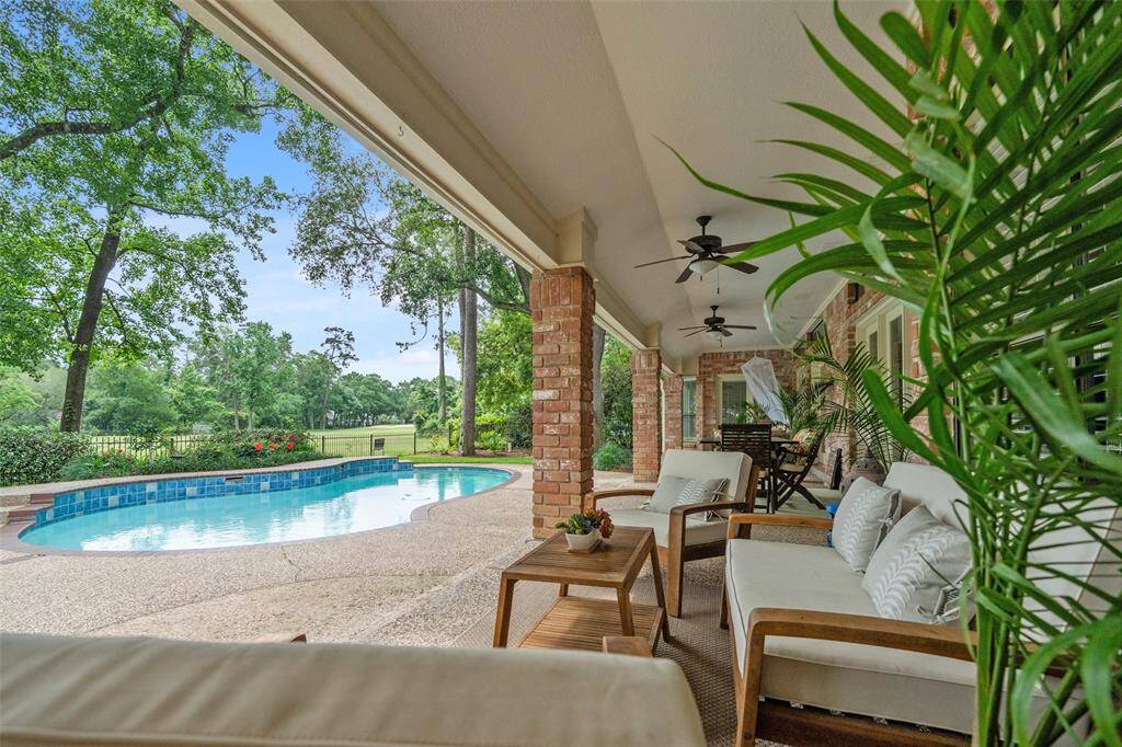 Enjoy the spacious shaded Veranda with the view of sparkling pool and golf course. Excellent for morning sunrise coffee and entertainment.