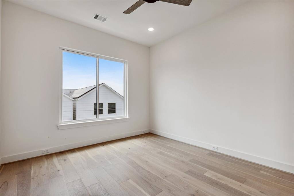 Another look at the secondary bedroom #1  as-is with no furnishings: tons of space to make it your own!