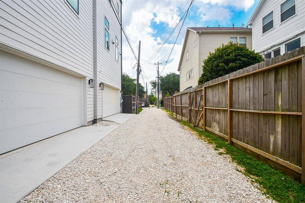 A rare alley access leads to your two car attached garage. Offers room for bigger vehicles to access with added gravel!
