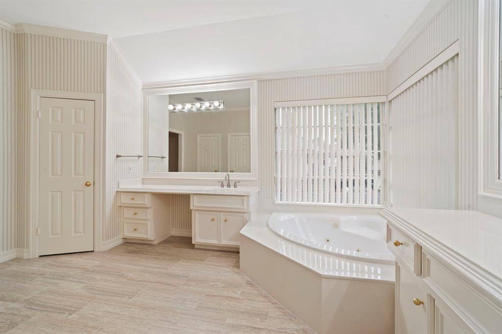 Beautifully updated in July 2023, the space features Italian Argento Al Contro tile flooring, stylish new fixtures, and a completely renovated walk-in shower that adds a fresh, contemporary touch.