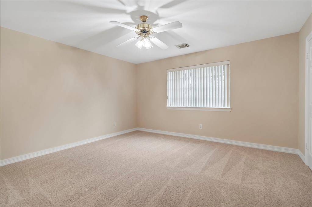 Additional upgrades include freshly painted interiors, brand-new carpet, and updated bathrooms.