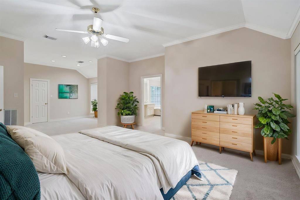 The spacious 10 x 12 sitting room within the primary suite offers incredible versatility—ideal as a cozy nursery, a private home office, or a serene workout space tailored to your lifestyle.