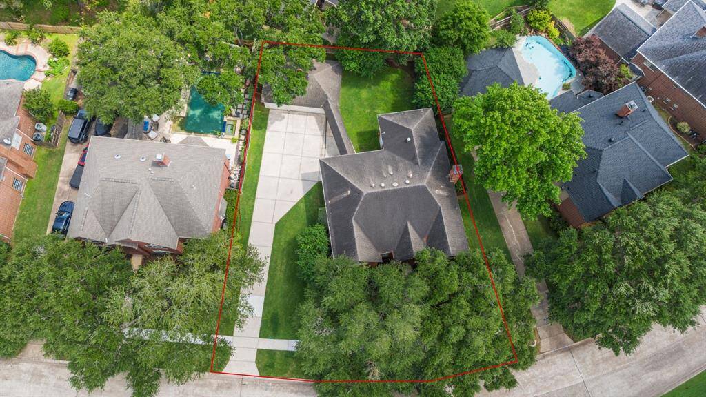 Spacious and meticulously maintained 11,578 sq ft lot, featuring mature landscaping that offers both beauty and privacy.