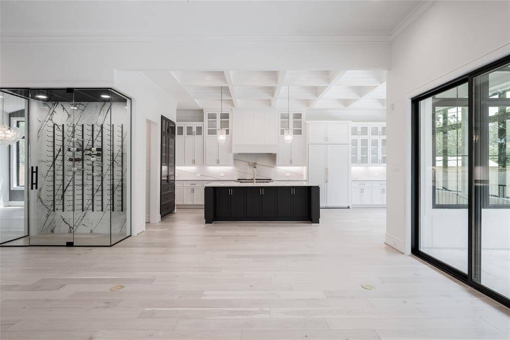 Kitchen, Temperature Controlled Wine Room & Kitchen Views**Example of previous built home