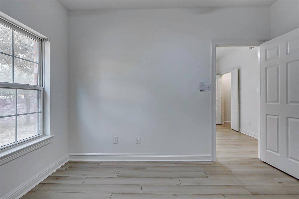 Another view of the 1st floor bedroom. Light, bright, move-in ready!